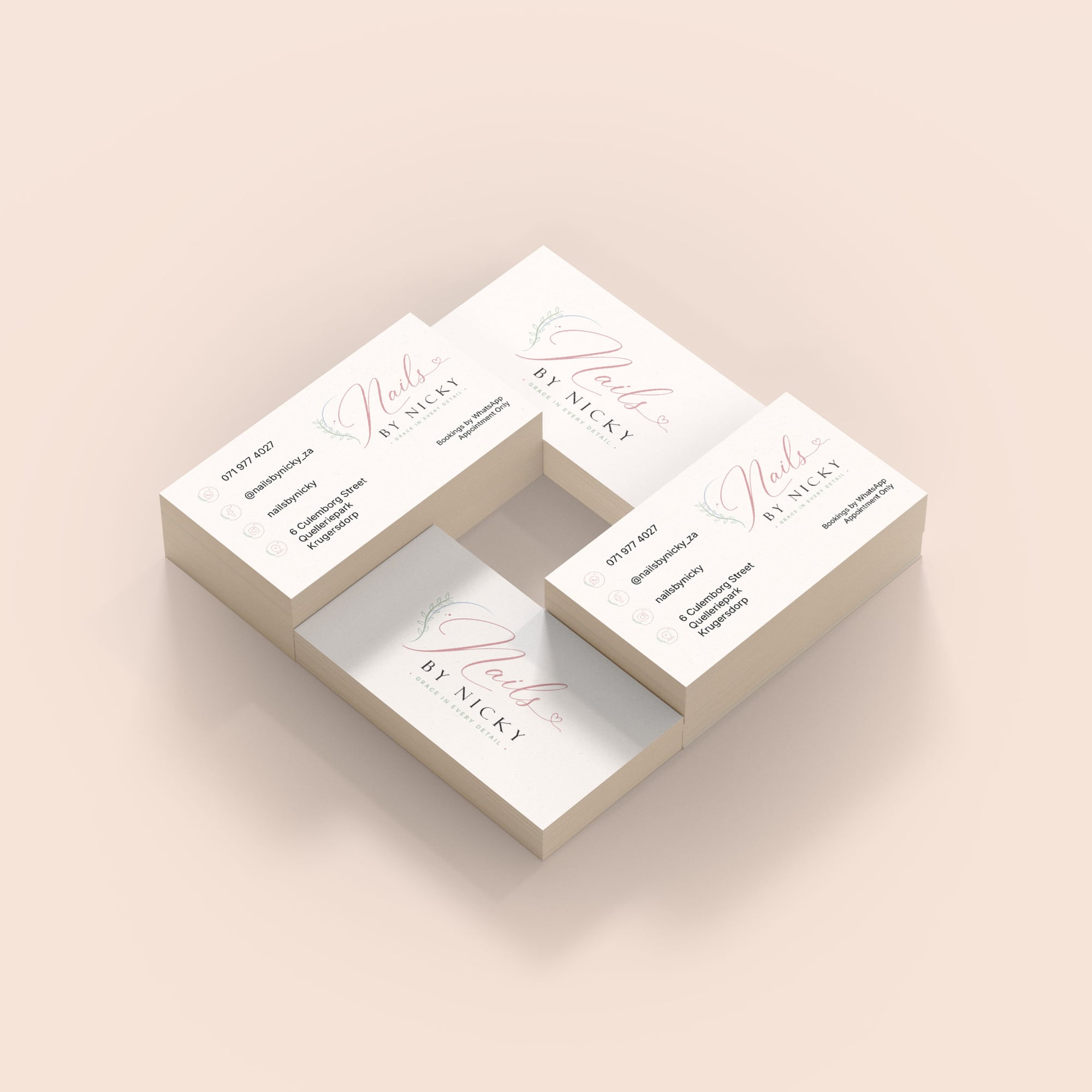 Nails by Nicky business card, styled stack mockup.
